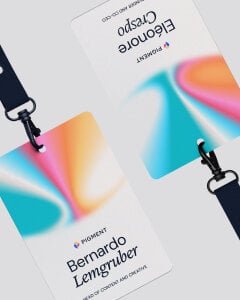 Lanyard of team member Prénom Nom with new AI branding